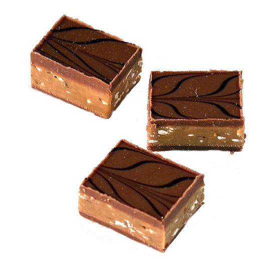 Valrhona pralines Rinette Lait met nougat & krokante amandelen in volle melk, 2 kg - Afbeelding van de verpakking van Valrhona pralines met melkchocolade, nougat en krokante amandelen in volle melk, 2 kilogram